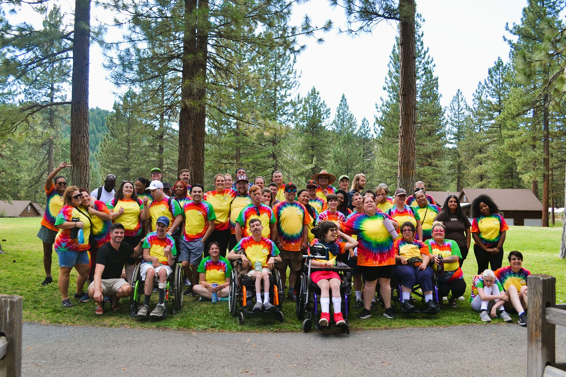 Group photo at a community event for Creative Living Options